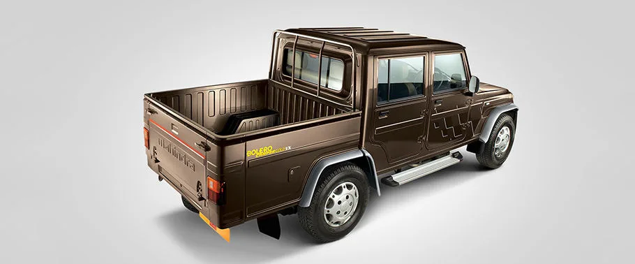 Bolero Camper, rear three-quarter with open cargo deck